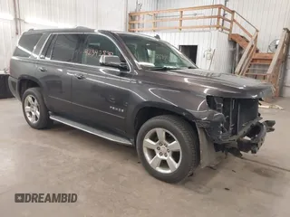 2015 Chevrolet Tahoe LTZ with VIN 1GNSKCKCXFR250255, listed as a IAAI auction lot 42333929 with 107,241 mi miles and . Bid and sale history available at DreamBid. Image 1.