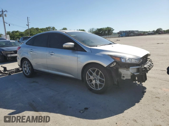 2015 Ford Focus SE z VIN 1FADP3F25FL283595, wystawiony jako Copart lot #57966705 z przebiegiem 182 405 mil mil oraz Szkoda całkowita • Salvage title. Historia ofert i sprzedaży dostępna na DreamBid. Obrazek 4.