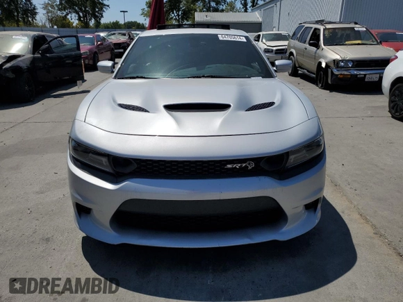 2019 Dodge Charger SRT Hellcat with VIN 2C3CDXL96KH588025, listed as a Copart auction lot 64705614 with 49,659 mi miles and Salvage Title. Bid and sale history available at DreamBid. Image 5.