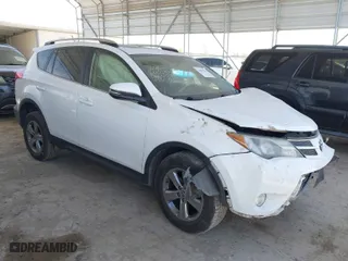 2015 Toyota RAV4 XLE with VIN JTMWFREVXFD066557, listed as a IAAI auction lot 41825354 with 173,595 mi miles. Bid and sale history available at carsss.com. Image 1.