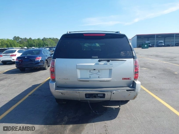 2011 GMC Yukon Denali with VIN 1GKS2EEF8BR346281, listed as a IAAI auction lot 42076037 with 264,311 mi miles. Bid and sale history available at carsss.com. Image 16.