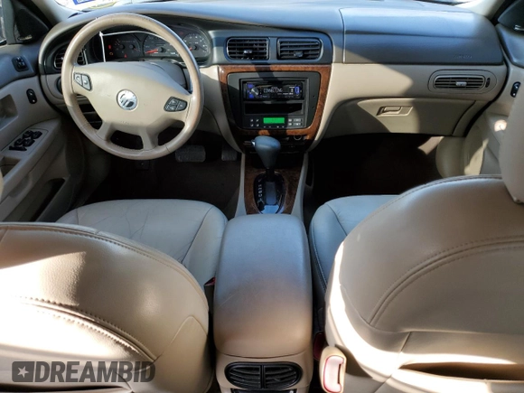 2000 Mercury Sable LS Premium z VIN 1MEFM55S0YA621927, wystawiony jako Copart lot #87052444 z przebiegiem 34 930 mil mil oraz Szkoda całkowita • Salvage title. Historia ofert i sprzedaży dostępna na DreamBid. Obrazek 8.