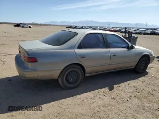 1999 Toyota Camry LE с VIN JT2BG22KXX0284593, выставлен на аукционе Copart как лот 54061685 с пробегом 229 047 миль миль и Списание • Salvage title. История ставок и продаж доступна на DreamBid. Изображение 3.