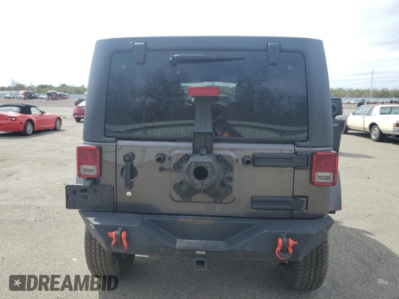 2018 Jeep Wrangler Unlimited Sahara with VIN 1C4BJWEG7JL856331, listed as a Copart auction lot 50246135 with 101,014 mi miles and Salvage title. Bid and sale history available at DreamBid. Image 6.