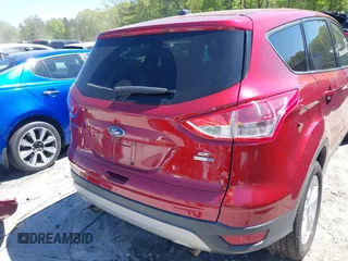 2016 Ford Escape SE with VIN 1FMCU9GX9GUC71209, listed as a IAAI auction lot 42037642 with 82,521 mi miles and . Bid and sale history available at DreamBid. Image 17.