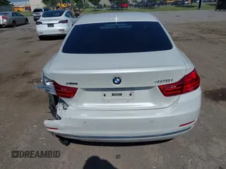2015 BMW 4 Series 428i xDrive with VIN WBA3N5C52FK484864, listed as a IAAI auction lot 42569077 with 95,431 mi miles and . Bid and sale history available at DreamBid. Image 16.