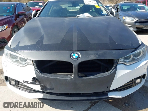 2014 BMW 4 Series 428i xDrive z VIN WBA3N9C50EF722242, wystawiony jako IAAI lot #41526322 z przebiegiem 134 254 mil mil oraz . Historia ofert i sprzedaży dostępna na DreamBid. Obrazek 6.