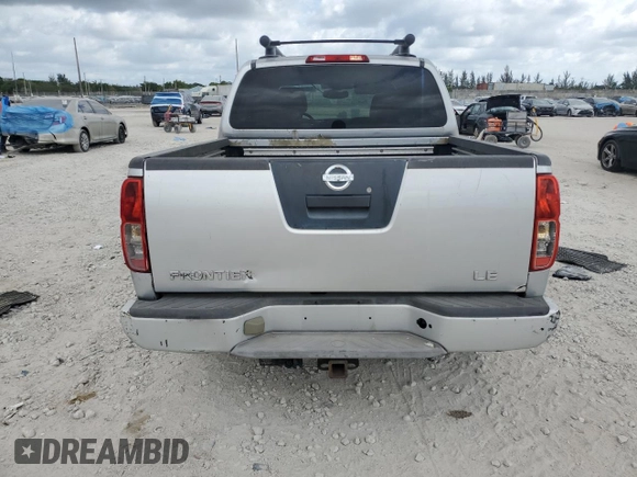 2005 Nissan Frontier LE with VIN 1N6AD07U75C452872, listed as a Copart auction lot 54954555 with 230,702 mi miles and Salvage title. Bid and sale history available at DreamBid. Image 6.