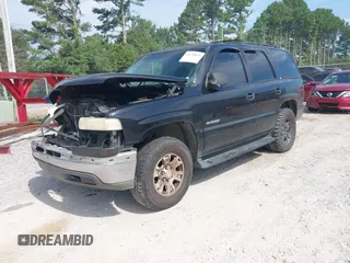 2002 Chevrolet Tahoe LS with VIN 1GNEC13Z12R249412, listed as a IAAI auction lot 42658863 with 261,383 mi miles and . Bid and sale history available at DreamBid. Image 2.