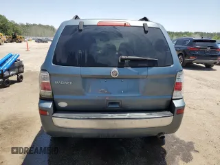2010 Mercury Mariner with VIN 4M2CN8B7XAKJ03580, listed as a Copart auction lot 57269525 with 265,789 mi miles and Salvage title. Bid and sale history available at DreamBid. Image 6.