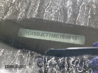 2021 Dodge Durango R/T z VIN 1C4SDJCT7MC786618, wystawiony jako Copart lot #55203945 z przebiegiem Nie podano mil oraz Szkody całkowita. Historia ofert i sprzedaży dostępna na DreamBid. Obrazek 13.