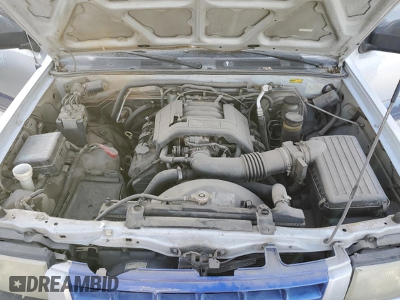 1999 Isuzu Rodeo S with VIN 4S2CK58W2X4361475, listed as a Copart auction lot 63873864 with 232,406 mi miles and Salvage Title. Bid and sale history available at DreamBid. Image 11.