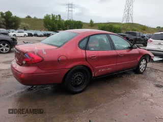 2001 Ford Taurus LX with VIN 1FAFP52UX1A176008, listed as a Copart auction lot 58983935 with 123,985 mi miles and Salvage title. Bid and sale history available at DreamBid. Image 3.