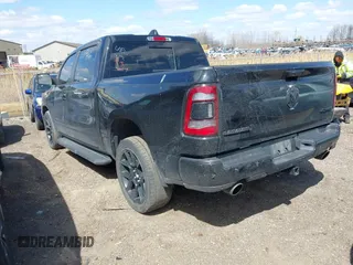 2023 Ram 1500 Laramie with VIN 1C6SRFJT6PN542105, listed as a IAAI auction lot 41974428 with 74,489 mi miles and . Bid and sale history available at DreamBid. Image 3.