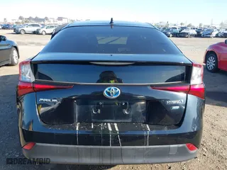 2021 Toyota Prius L Eco with VIN JTDKAMFU1M3134107, listed as a IAAI auction lot 41763080 with 185,248 mi miles. Bid and sale history available at carsss.com. Image 17.