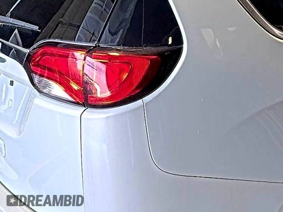 2017 Chrysler Pacifica Touring with VIN 2C4RC1DG5HR764942, listed as a IAAI auction lot 42796303 with 64,391 mi miles and . Bid and sale history available at DreamBid. Image 40.