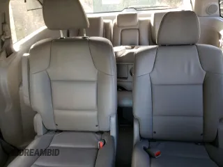 2014 Honda Odyssey Touring z VIN 5FNRL5H98EB512144, wystawiony jako Copart lot #69987533 z przebiegiem 184 231 mil mil oraz Szkoda całkowita • Salvage title. Historia ofert i sprzedaży dostępna na DreamBid. Obrazek 10.