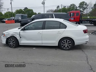 2016 Volkswagen Jetta Sedan 1.4T SE with VIN 3VWD67AJ6GM260584, listed as a IAAI auction lot 41903048 with 104,876 mi miles. Bid and sale history available at carsss.com. Image 14.