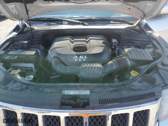 2012 Jeep Grand Cherokee Overland with VIN 1C4RJFCG5CC272580, listed as a Copart auction lot 50075735 with 209,368 mi miles and Salvage Title. Bid and sale history available at carsss.com. Image 12.