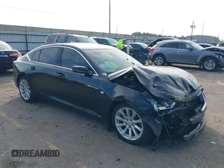 2022 Cadillac CT5 Luxury z VIN 1G6DW5RK3N0109970, wystawiony jako IAAI lot #41382657 z przebiegiem 37 502 mil mil oraz . Historia ofert i sprzedaży dostępna na DreamBid. Obrazek 1.