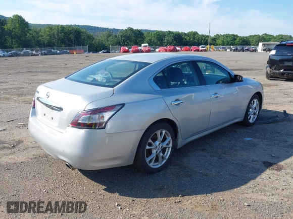 2014 Nissan Maxima SV with VIN 1N4AA5AP3EC481223, listed as a IAAI auction lot 39807318 with 106,882 mi miles and . Bid and sale history available at DreamBid. Image 4.