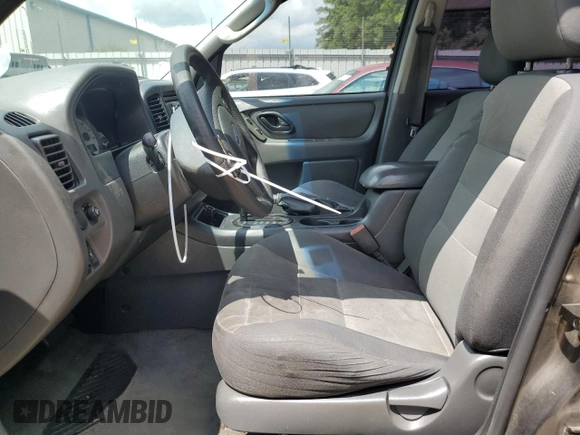 2006 Ford Escape XLS with VIN 1FMYU02Z56KD47674, listed as a Copart auction lot 60668134 with 248,535 mi miles and Salvage Title. Bid and sale history available at carsss.com. Image 7.