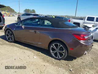 2016 Buick Cascada Premium with VIN W04WT3N55GG116328, listed as a IAAI auction lot 41854034 with 146,423 mi miles and . Bid and sale history available at DreamBid. Image 3.