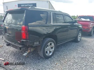 2015 Chevrolet Tahoe LTZ z VIN 1GNSCCKC8FR121461, wystawiony jako IAAI lot #42407901 z przebiegiem 137 729 mil mil oraz . Historia ofert i sprzedaży dostępna na DreamBid. Obrazek 4.