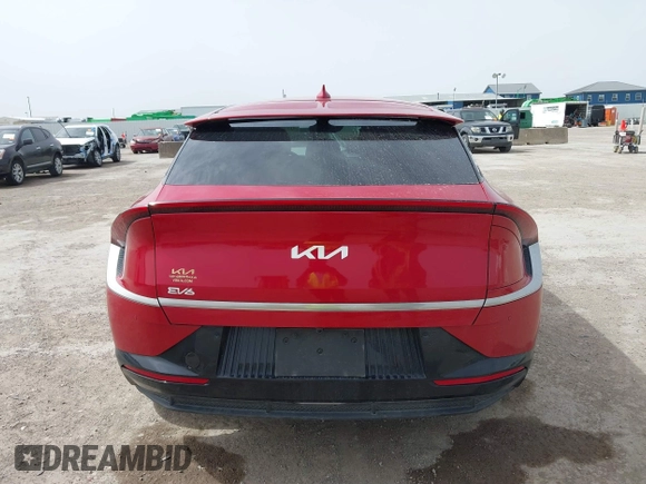 2022 Kia EV6 Wind z VIN KNDC3DLC6N5089018, wystawiony jako IAAI lot #41748175 z przebiegiem 25 157 mil mil oraz . Historia ofert i sprzedaży dostępna na DreamBid. Obrazek 16.