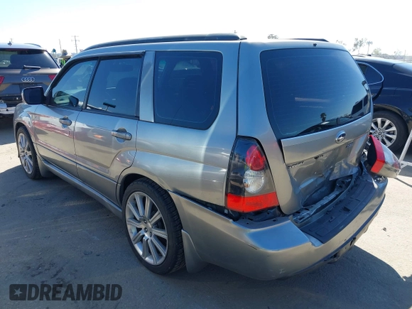 2007 Subaru Forester Sports XT with VIN JF1SG69687H733459, listed as a IAAI auction lot 41827464 with 139,943 mi miles. Bid and sale history available at carsss.com. Image 3.