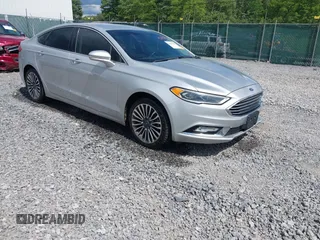 2017 Ford Fusion Titanium with VIN 3FA6P0K99HR112234, listed as a IAAI auction lot 42332700 with 106,685 mi miles and . Bid and sale history available at DreamBid. Image 1.