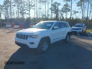 2017 Jeep Grand Cherokee Laredo with VIN 1C4RJFAG7HC688625, listed as a IAAI auction lot 41295860 with 115,714 mi miles. Bid and sale history available at carsss.com. Image 2.