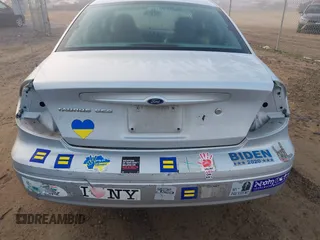 2004 Ford Taurus SES z VIN 1FAHP55S34G131304, wystawiony jako IAAI lot #41130286 z przebiegiem 112 404 mil mil oraz . Historia ofert i sprzedaży dostępna na DreamBid. Obrazek 6.