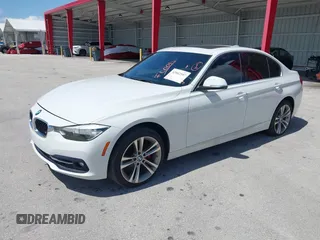 2018 BMW 3 Series 330i with VIN WBA8B9G52JNU57283, listed as a IAAI auction lot 42042507 with 51,740 mi miles and . Bid and sale history available at DreamBid. Image 2.