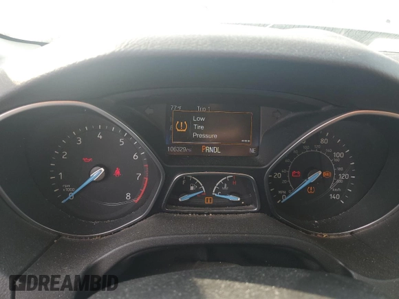 2016 Ford Focus SE z VIN 1FADP3F20GL267077, wystawiony jako Copart lot #53649665 z przebiegiem 106 329 mil mil oraz Szkoda całkowita • Salvage title. Historia ofert i sprzedaży dostępna na DreamBid. Obrazek 9.