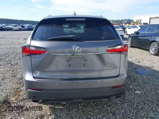 2016 Lexus NX 200t with VIN JTJYARBZ9G2036927, listed as a IAAI auction lot 41609837 with 215,448 mi miles. Bid and sale history available at carsss.com. Image 16.