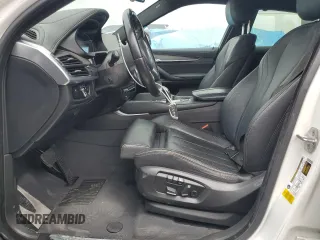 2017 BMW X6 sDrive35i z VIN 5UXKU0C36H0G68031, wystawiony jako Copart lot #52830915 z przebiegiem 67 224 mil mil oraz Szkoda całkowita • Salvage title. Historia ofert i sprzedaży dostępna na DreamBid. Obrazek 7.