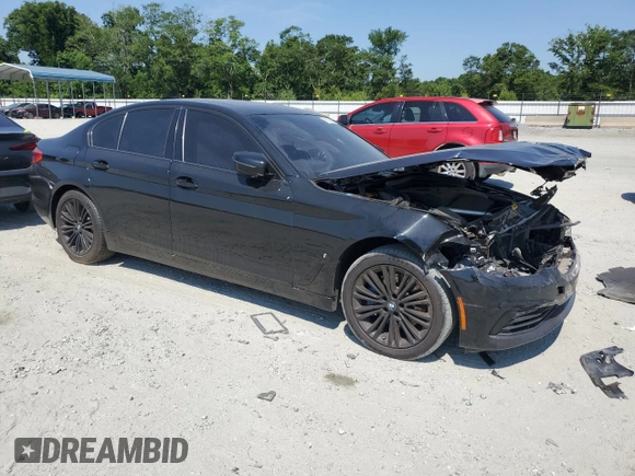 2018 BMW 5 Series 530e with VIN WBAJA9C5XJB249695, listed as a Copart auction lot 61974345 with Not provided miles and Clean title. Bid and sale history available at DreamBid. Image 4.
