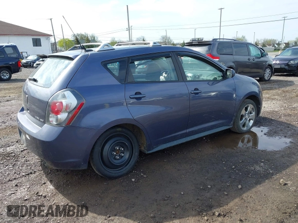 2009 Pontiac Vibe with VIN 5Y2SM67069Z422076, listed as a IAAI auction lot 42158045 with 180,568 mi miles. Bid and sale history available at carsss.com. Image 4.