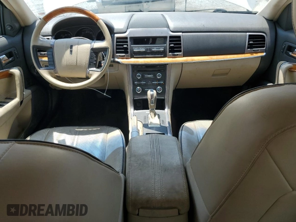 2010 Lincoln MKZ z VIN 3LNHL2GC0AR656881, wystawiony jako Copart lot #57591735 z przebiegiem 76 596 mil mil oraz Szkoda całkowita • Salvage title. Historia ofert i sprzedaży dostępna na DreamBid. Obrazek 8.