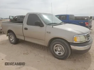 2002 Ford F-150 XL z VIN 1FTRF17292KE39045, wystawiony jako Copart lot #48860845 z przebiegiem 111 176 mil mil oraz Czysty tytuł • Clean title. Historia ofert i sprzedaży dostępna na DreamBid. Obrazek 4.