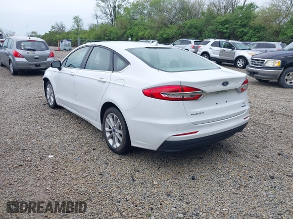 2020 Ford Fusion SE with VIN 3FA6P0LU5LR151074, listed as a IAAI auction lot 42146290 with 98,574 mi miles and . Bid and sale history available at carsss.com. Image 3.