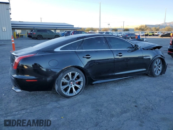 2015 Jaguar XJ z VIN SAJWA1CZ5F8V90554, wystawiony jako Copart lot #83623994 z przebiegiem 104 440 mil mil oraz Szkoda całkowita • Salvage title. Historia ofert i sprzedaży dostępna na DreamBid. Obrazek 3.