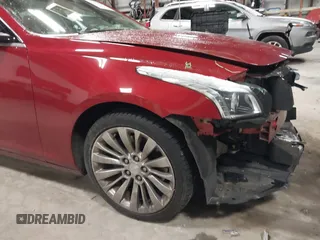 2016 Cadillac CTS Luxury Collection AWD z VIN 1G6AX5SX6G0124584, wystawiony jako IAAI lot #41235515 z przebiegiem 82 286 mil mil oraz . Historia ofert i sprzedaży dostępna na DreamBid. Obrazek 19.