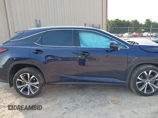 2022 Lexus RX 350 with VIN 2T2HZMAA5NC232352, listed as a IAAI auction lot 42399381 with 13,359 mi miles and . Bid and sale history available at DreamBid. Image 13.