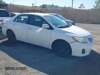 2013 Toyota Corolla L with VIN 5YFBU4EE2DP125215, listed as a IAAI auction lot 42158224 with 196,550 mi miles. Bid and sale history available at carsss.com. Image 1.