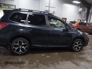 2014 Subaru Forester 2.0XT Touring with VIN JF2SJGPC7EH425711, listed as a IAAI auction lot 41549382 with 119,039 mi miles. Bid and sale history available at carsss.com. Image 13.
