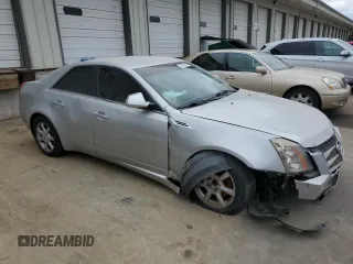 2009 Cadillac CTS RWD w/1SA with VIN 1G6DF577590150928, listed as a Copart auction lot 75338354 with 127,997 mi miles and Salvage Title. Bid and sale history available at carsss.com. Image 4.