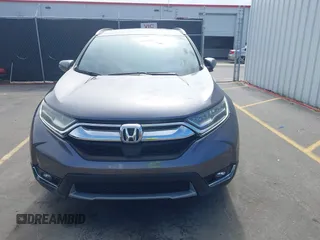 2018 Honda CR-V Touring with VIN 7FARW1H9XJE018575, listed as a IAAI auction lot 41747192 with 83,699 mi miles and . Bid and sale history available at carsss.com. Image 12.
