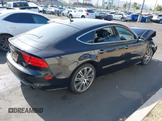 2014 Audi A7 Prestige with VIN WAU2GAFC5EN012583, listed as a IAAI auction lot 42561824 with Not provided miles and . Bid and sale history available at DreamBid. Image 4.